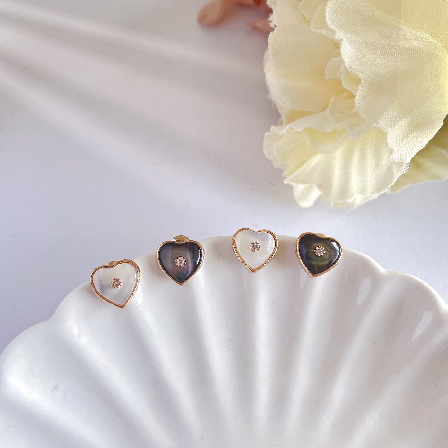 Mini heart mother of pearl stud earrings